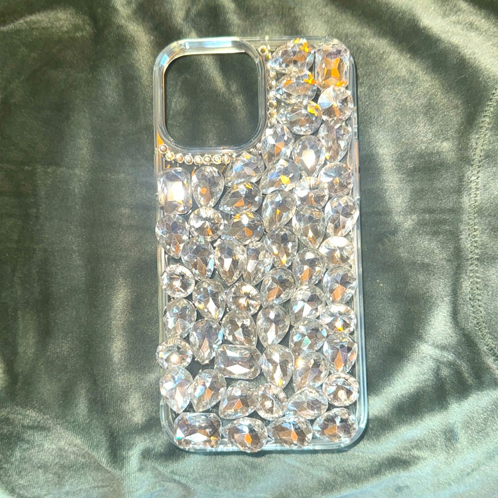 Ultra Glam diamond covered IPhone Case with small diamond trim around camera